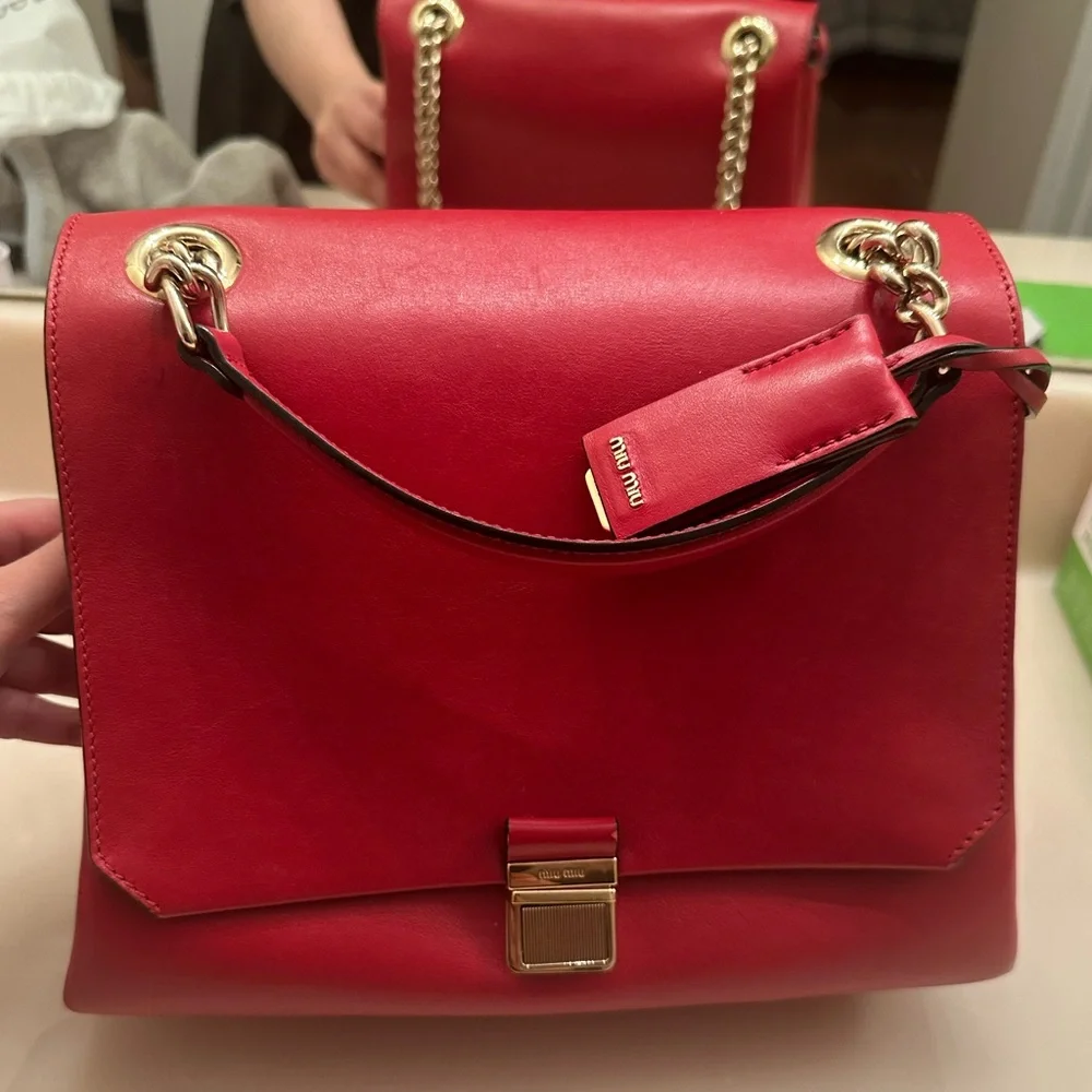 Very rare Miu Miu $2500 Authentic Red Leather Chain Handle Shoulder Bag.